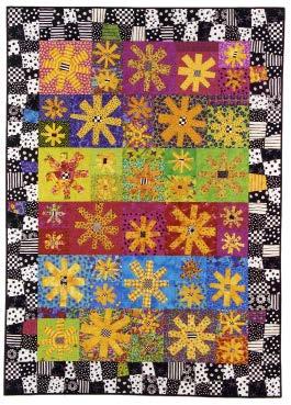 Colorful quilt with geometric flowers pattern on a black background