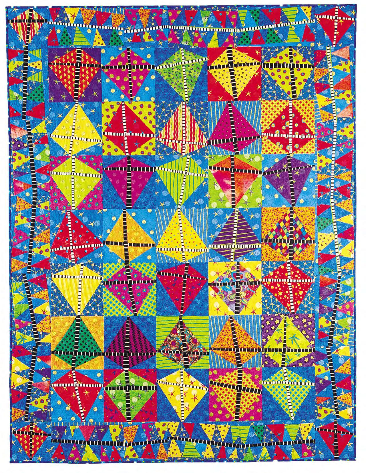 Colorful patterned quilt with geometric pattern on a white background