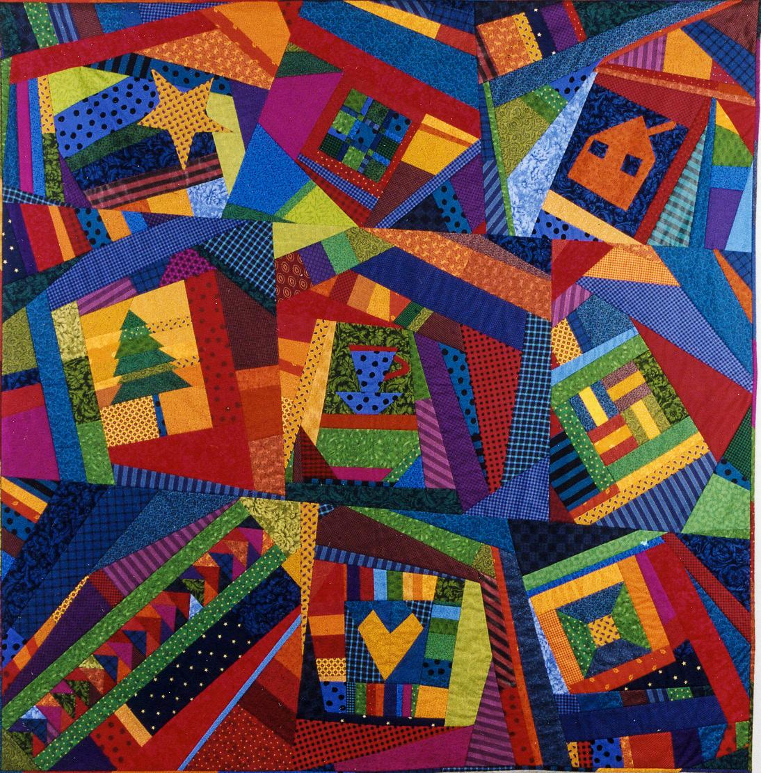Colorful quilt with geometric patterns and house shapes