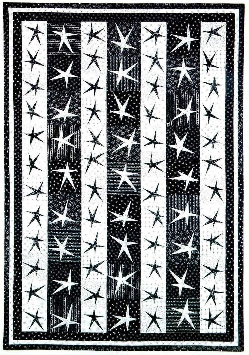 Stargazey Quilts pattern book with star design on a yellow background