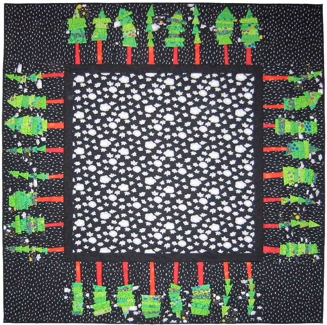 Quilt with Christmas tree pattern on a black background