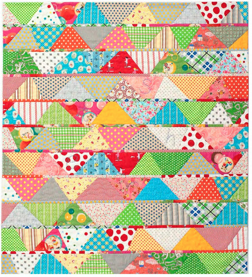 Baby quilt with a festive bunting motif and mixed pattern materials